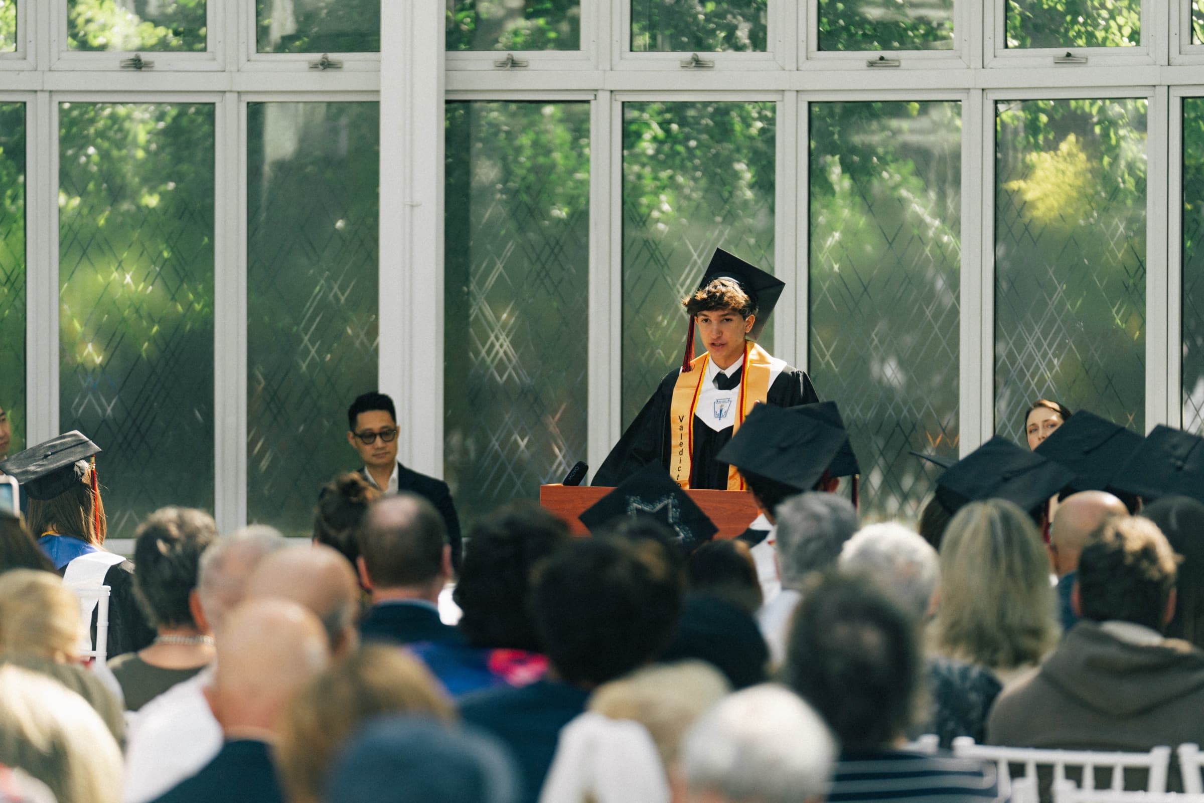 Gregory delivering his valedictorian address