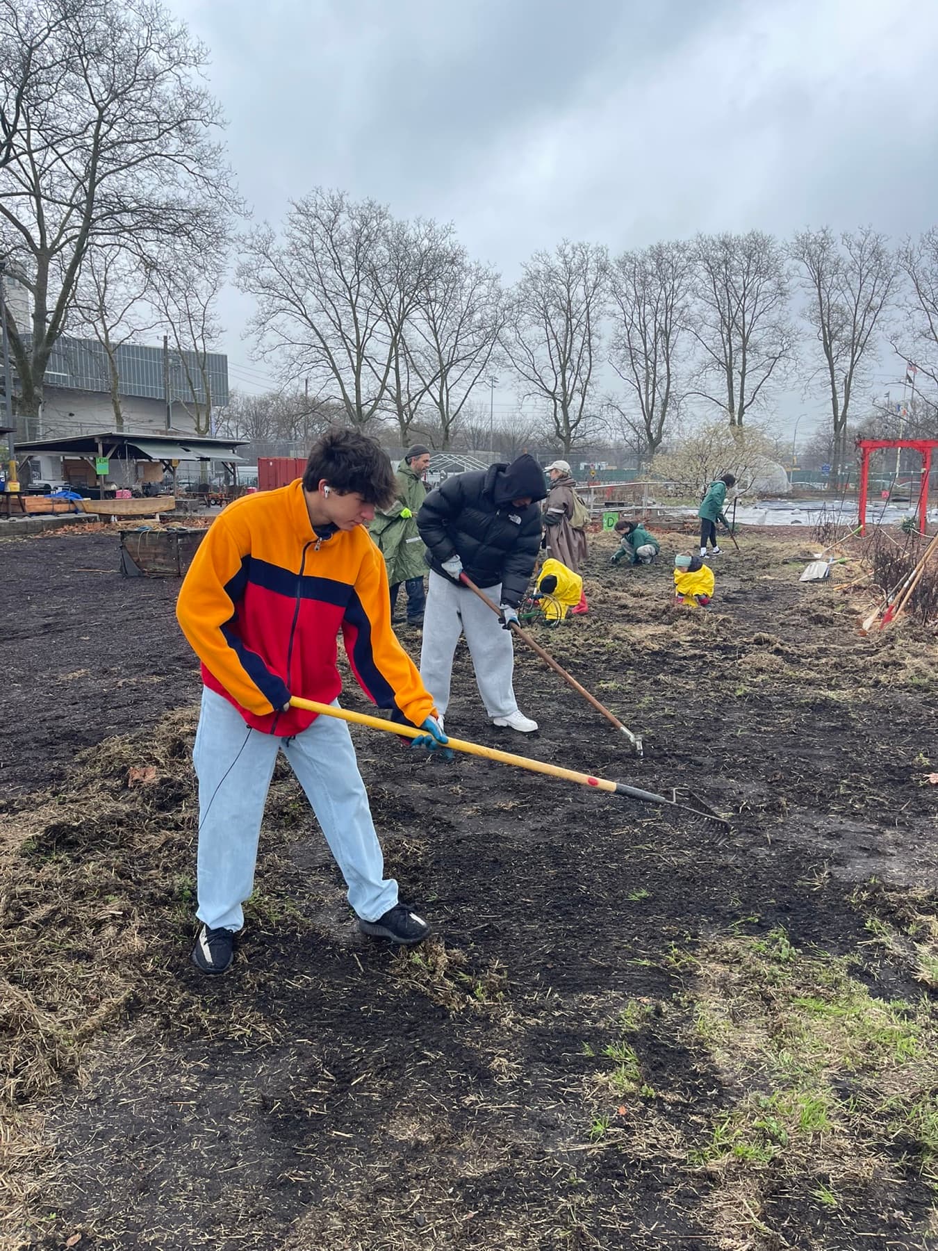 Gregory and community volunteers working in a New York City garden